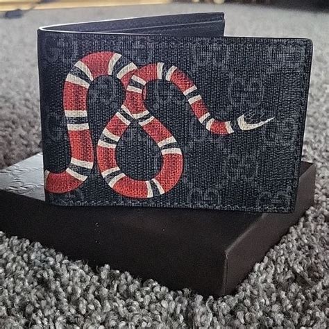 fake pink gucci wallet|authentic gucci snake wallet.